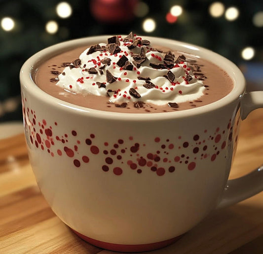 This Christmas Eve Hot Chocolate is rich, creamy, and made in the slow cooker with chocolate chips, cocoa, and sweetened condensed milk for the ultimate holiday drink.