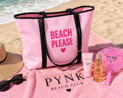 Pink 'Beach Please' bag with PYNK Beach Club products on a beach towel.